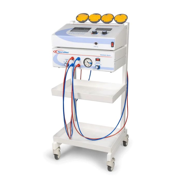 A white medical device on wheels with control knobs, four yellow dials, and red and blue cables. It features two shelves and a pressure gauge.